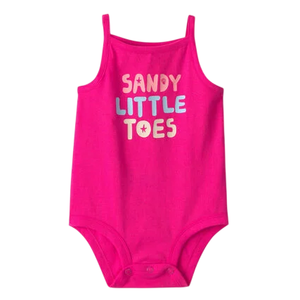 Bright pink baby onesie with thin shoulder straps, featuring the text \“Sandy Little Toes\“ in colorful letters on the front.