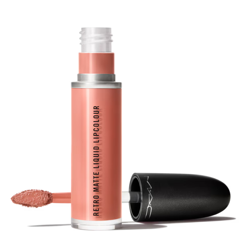 A tube of MAC Retro Matte Liquid Lipcolour in a peachy shade, with an applicator wand partially extended.