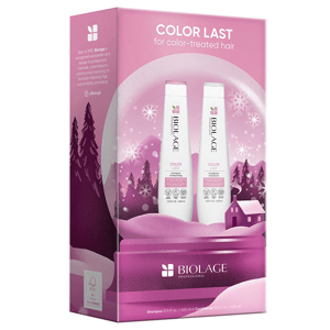 Biolage Color Last set includes a 13.5 fl. oz. shampoo and conditioner duo designed for color-treated hair, packaged in a pink winter-themed box with snowflakes and trees.