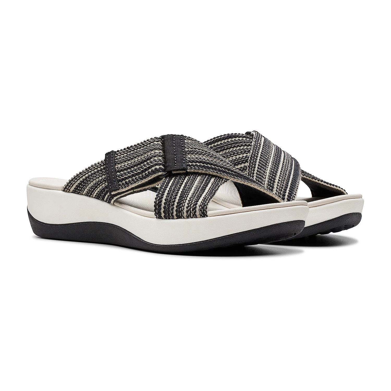 A pair of striped sandals with an open-toe design and a thick, cushioned sole.
