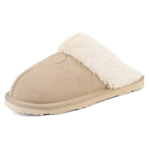A beige slipper with a fluffy cream lining and a textured sole, designed for indoor comfort and warmth.