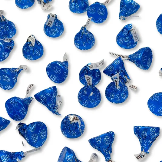 Hershey's Kisses with blue foil wrapping featuring cookie designs, labeled \“COOKIES\“ and \“KISSES\“ on the tags, totaling 5 pounds.