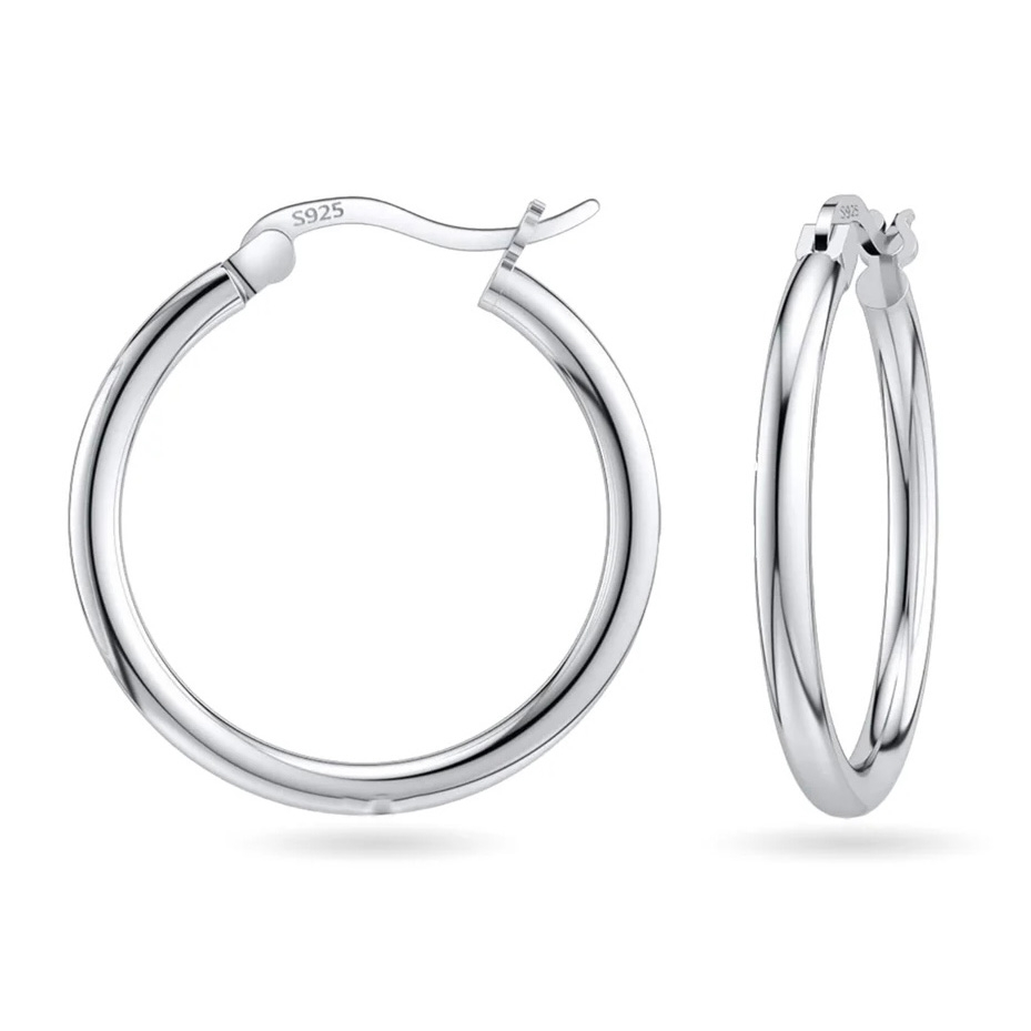 A pair of silver hoop earrings with a 925 stamp indicating sterling silver purity.