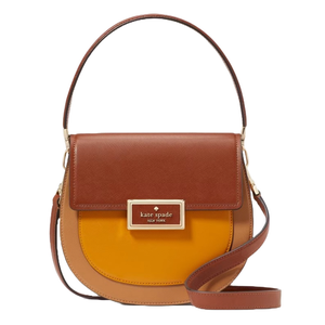 The Kate Spade Leather Saddle Bag features a colorblock design with shades of tan, yellow, and brown. It has a flap closure, adjustable shoulder strap, and a front logo plaque.