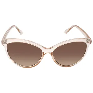 Transparent cat-eye sunglasses with brown gradient lenses.