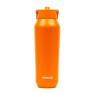 An orange ICEMULE insulated bottle with a flip-top lid, designed for keeping beverages hot or cold.