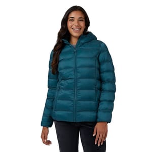 A woman is wearing a teal puffer jacket with a hood, featuring a front zipper and two side pockets.