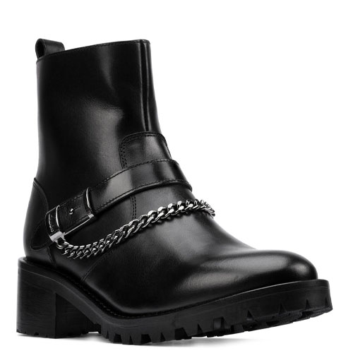 Black ankle boot with a chunky sole, featuring a decorative chain and buckle strap across the front.