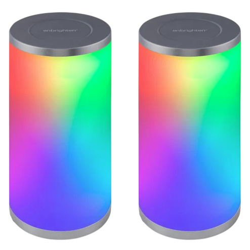 A pair of cylindrical LED lanterns displaying a gradient of rainbow colors, with brushed metal tops and bottoms, and the brand name \“enbrighten\“ on top.