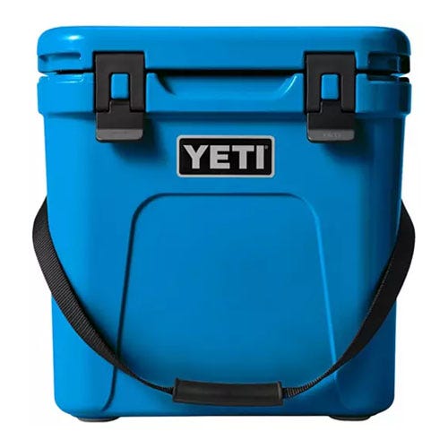 A blue small cooler from the Yeti brand.