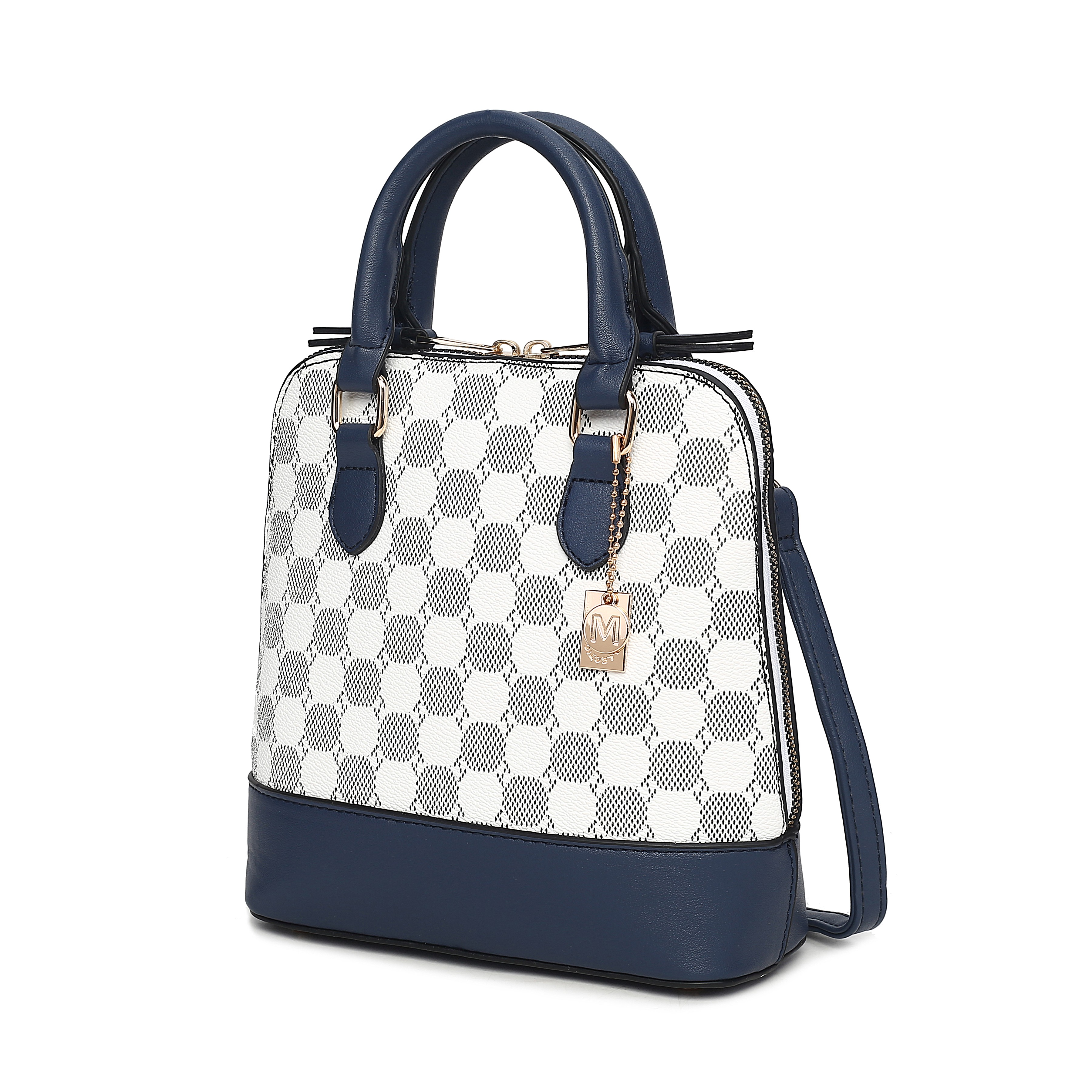 A stylish handbag featuring a blue and white pattern with blue leather accents, double handles, a detachable strap, and a gold charm with an \“M\“ initial.