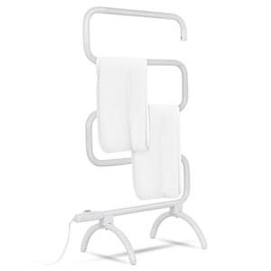 White electric towel warmer with three bars and a plug-in cord, holding two white towels.