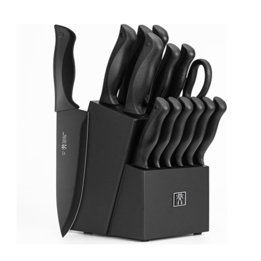 A black knife block set containing multiple kitchen knives with black handles, featuring various blade types and sizes, along with a pair of kitchen shears.