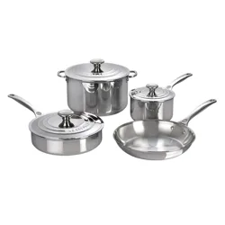 Stainless steel cookware set including a saucepan, stockpot, frying pan, and sauté pan, each with a matching lid, from Le Creuset.