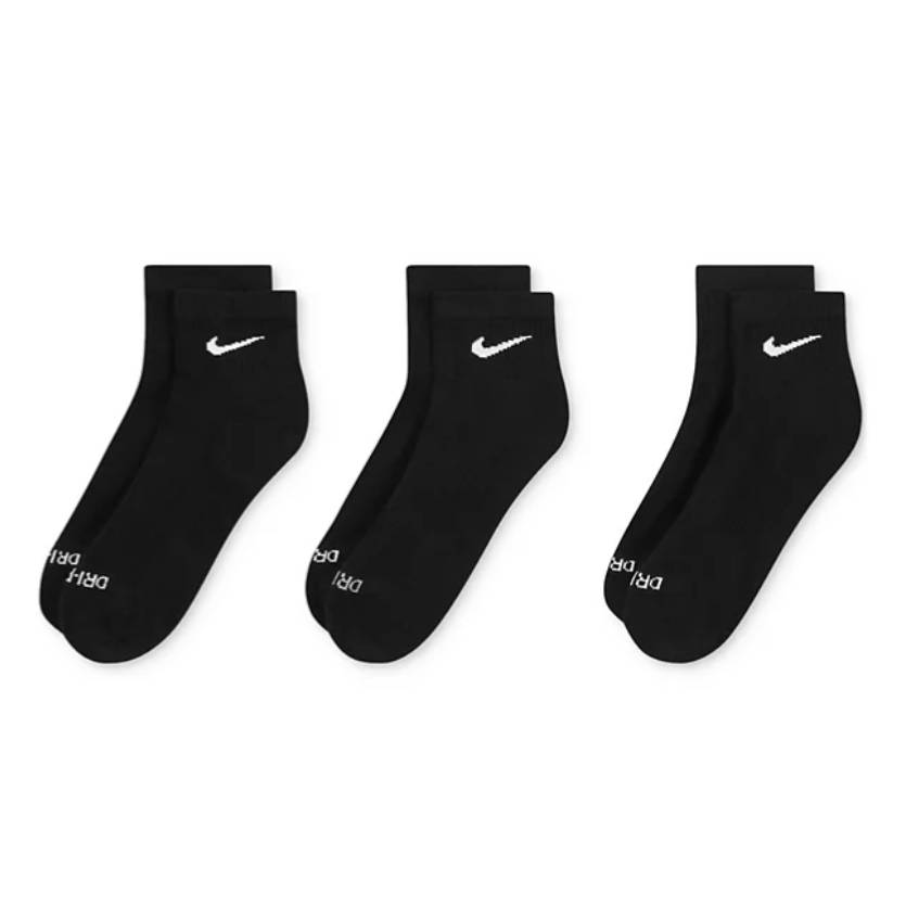 Three pairs of black ankle socks with white Nike logos and \“DRI-FIT\“ text near the toes.