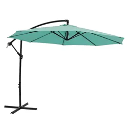A teal cantilever patio umbrella with a curved black stand and crank handle.