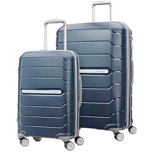 Two blue hard-shell suitcases with telescopic handles and four double wheels, designed for easy maneuverability and durability.