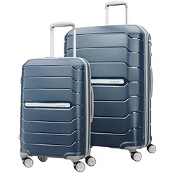 Two blue hard-shell suitcases with telescopic handles and four double wheels, designed for easy maneuverability and durability.