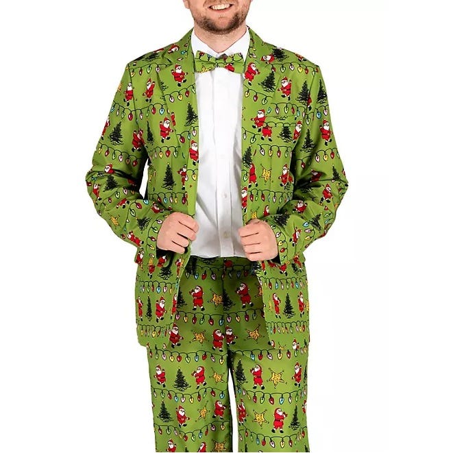 Green suit with a festive holiday pattern featuring Santa, Christmas trees, and strings of lights. Includes a matching jacket, pants, and bow tie, with light-up elements for added holiday cheer.