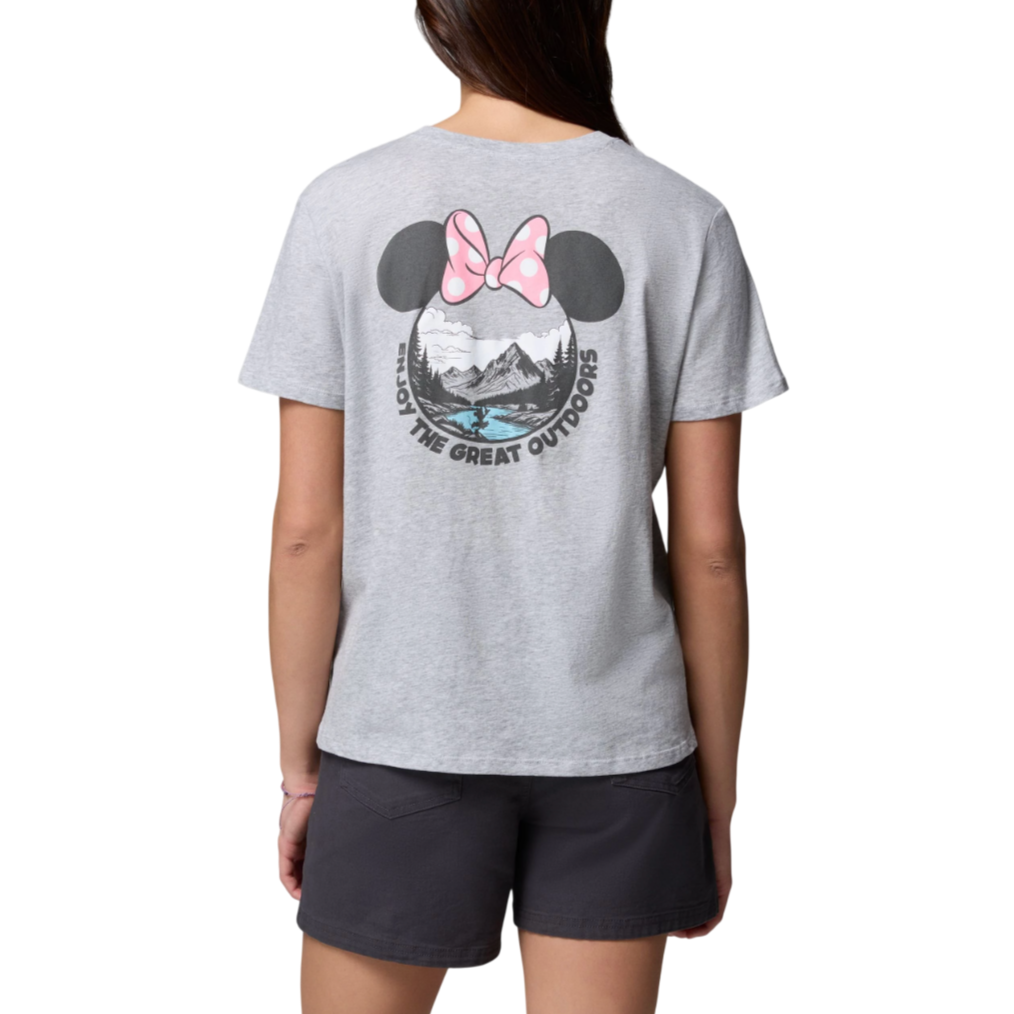 A person is wearing a gray T-shirt featuring a graphic of black mouse ears with a pink polka-dot bow and a mountain landscape, with the text \“Enjoy the Great Outdoors,\“ paired with dark shorts.