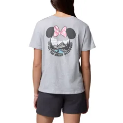 A person is wearing a gray T-shirt featuring a graphic of black mouse ears with a pink polka-dot bow and a mountain landscape, with the text \“Enjoy the Great Outdoors,\“ paired with dark shorts.