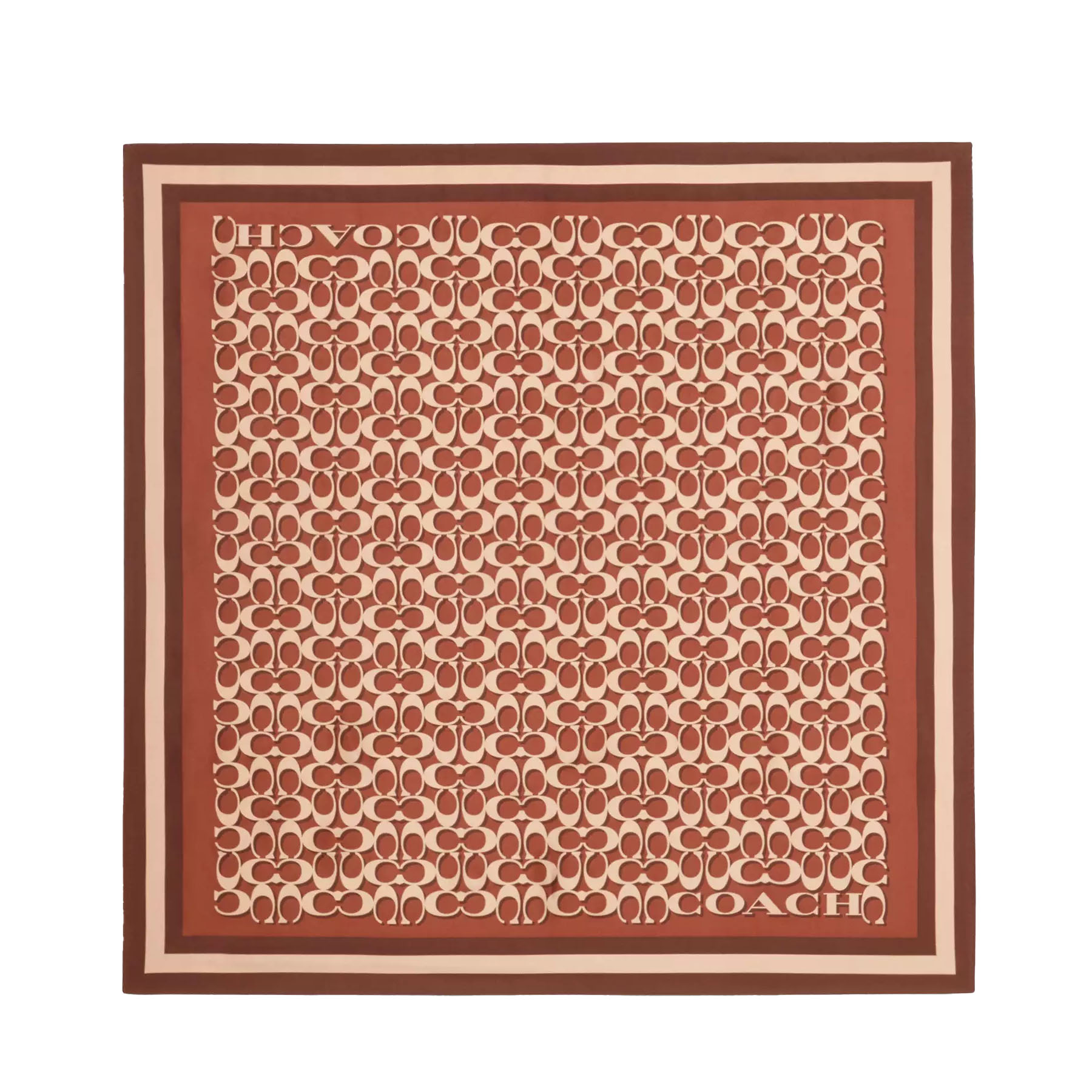 A silk scarf with Coach's signature print, featuring a pattern of repeating \“C\“ designs in cream and rust tones, bordered by stripes in similar shades.