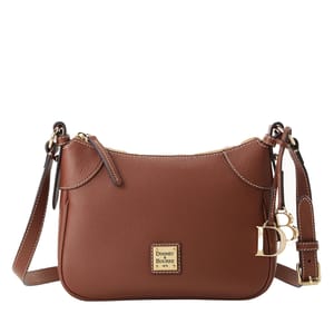 A brown Dooney & Bourke leather crossbody bag with gold hardware, featuring a central plaque with the brand logo, adjustable strap, and decorative gold letter charms.