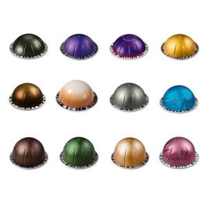 The Nespresso 36ct variety pack showcases 12 different coffee pod flavors, each with distinct colors and labels. The pods include various roast profiles and origins for a diverse tasting experience.