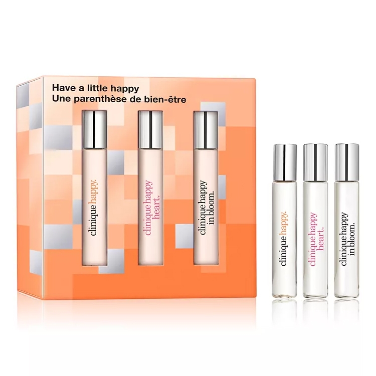 Set of Clinique fragrances includes three travel-sized perfumes: Clinique Happy, Clinique Happy Heart, and Clinique Happy in Bloom, packaged together in an orange box.