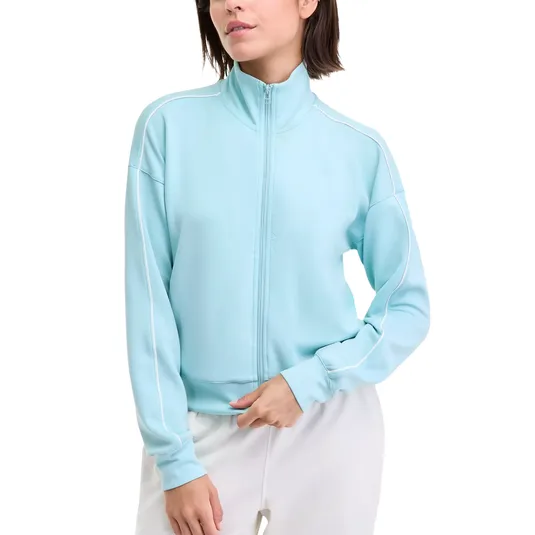 Light blue zip-up track jacket with white piping on sleeves, worn by a person paired with white pants.