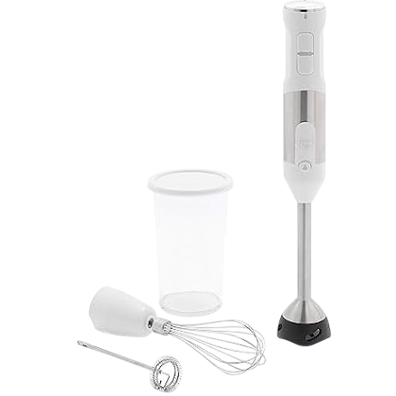 A handheld immersion blender set includes a blending arm, whisk attachment, frother, and a measuring cup with a lid, all in a sleek white and stainless steel finish.