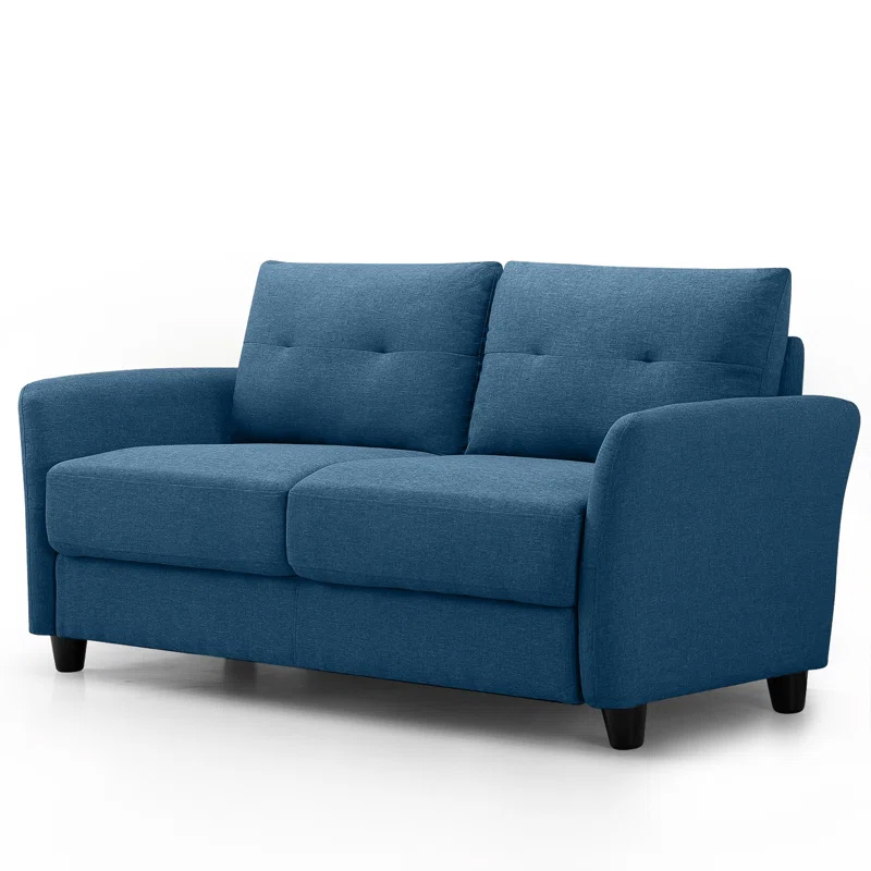 Blue upholstered loveseat with tufted back cushions, rounded armrests, and black cylindrical legs. Ideal for compact living spaces.