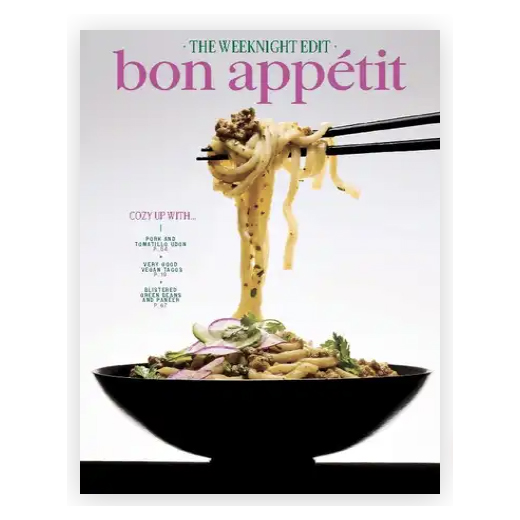 Bon Appétit magazine cover featuring a bowl of noodles being lifted with chopsticks. The text highlights recipes like pork and tomato-y beans, vegan goods, and blended soups.