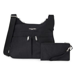 A black Baggallini crossbody bag with dual front zippers, adjustable strap, and matching wristlet pouch. The design is simple and functional, suitable for everyday use.