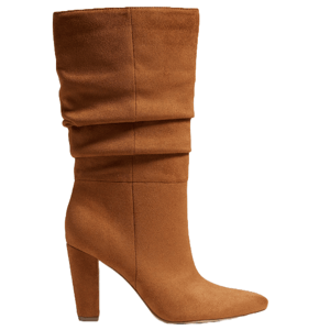 A tan-colored, knee-high, slouchy boot made of vegan leather with a high chunky heel and a pointed toe design.
