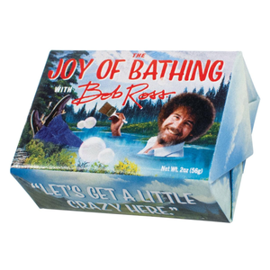 \“The Joy of Bathing with Bob Ross\“ packaged soap with 2 oz (56g) weight features artwork of a person relaxing in a bubble bath, holding a brush, with the quote \“Let's get a little crazy here.\“