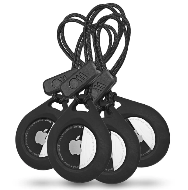 Four black silicone keychain holders with rope loops, designed to hold circular tracking devices featuring a distinct logo.