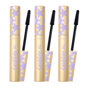 Three tubes of Tartelette XL tubing mascara with lavender stars on gold packaging and black bristle wands.