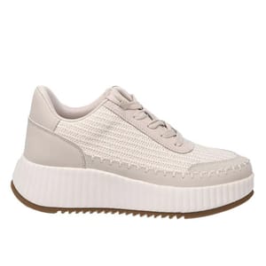 A beige lace-up sneaker with a textured upper and a thick, ribbed white sole for added height.