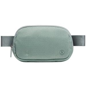 A compact, textured crossbody bag with a front zipper and adjustable strap, featuring a subtle logo on the corner.