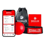 The Boxbollen Set includes a red ball attached to a black headband, a storage pouch, and a card, along with a mobile app displaying leaderboard scores in the background.