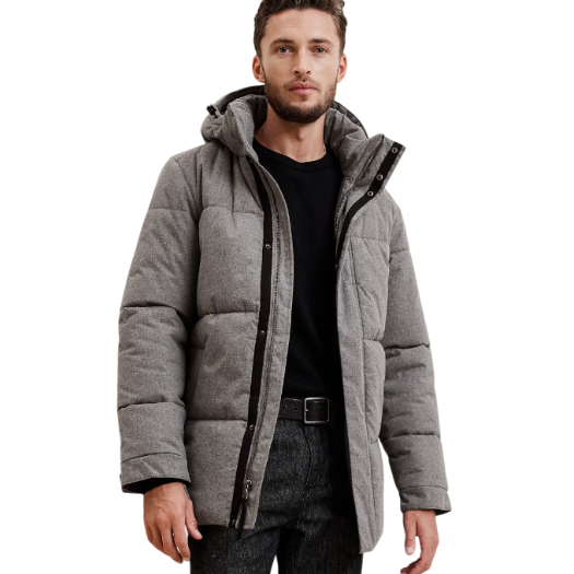 A man wears a gray Banana Republic Factory puffer jacket with a hood, featuring a black shirt and gray pants. The jacket appears warm and quilted, suitable for colder weather.
