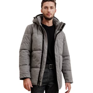 A man wears a gray Banana Republic Factory puffer jacket with a hood, featuring a black shirt and gray pants. The jacket appears warm and quilted, suitable for colder weather.