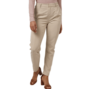 Beige high-waisted trousers paired with a pink long-sleeve top and brown heeled sandals.