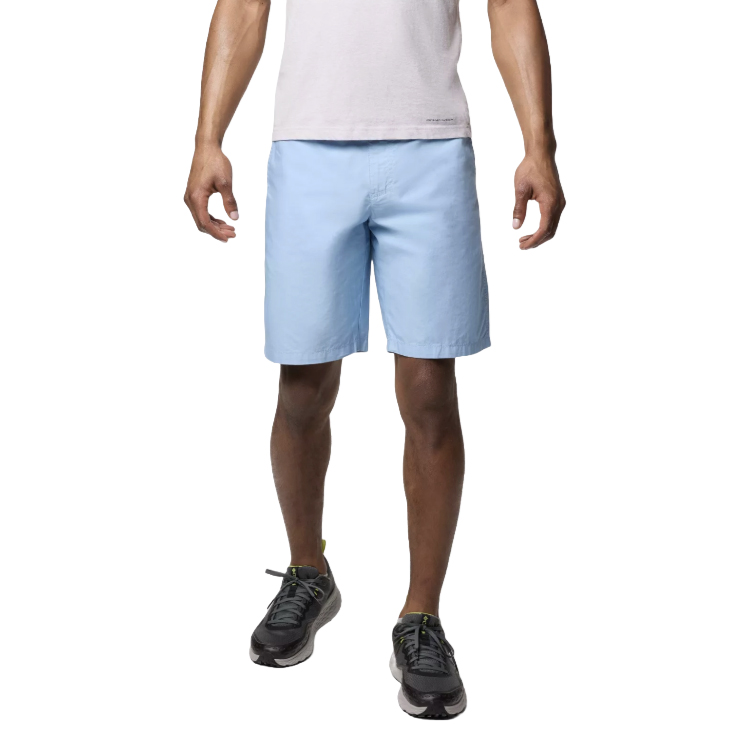 A person is wearing light blue shorts, a light-colored T-shirt, and black sneakers.