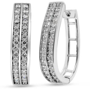 1ct Diamond Hoops feature a sleek design with two parallel rows of sparkling diamonds set in a polished metal frame, offering elegance and sophistication.