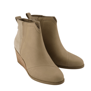 Beige ankle boots with a wedge heel and pull tabs, featuring a smooth finish and subtle stitching details.
