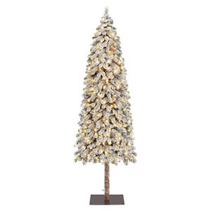 This is a slim, artificial Christmas tree with dense branches, a significant amount of white flocking giving it a snow-covered appearance, and it's pre-lit with lights for a bright, festive look.