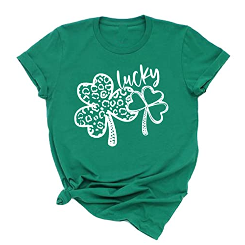 Green t-shirt with a design featuring two shamrocks, one patterned with leopard spots and the word \“lucky\“ in a playful script above them.