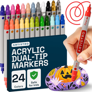 Artistro Acrylic Dual-Tip Markers set includes 24 vibrant colors, designed to be safe for kids. The packaging features a painted rock with a pumpkin design, illustrating the markers' creative potential.